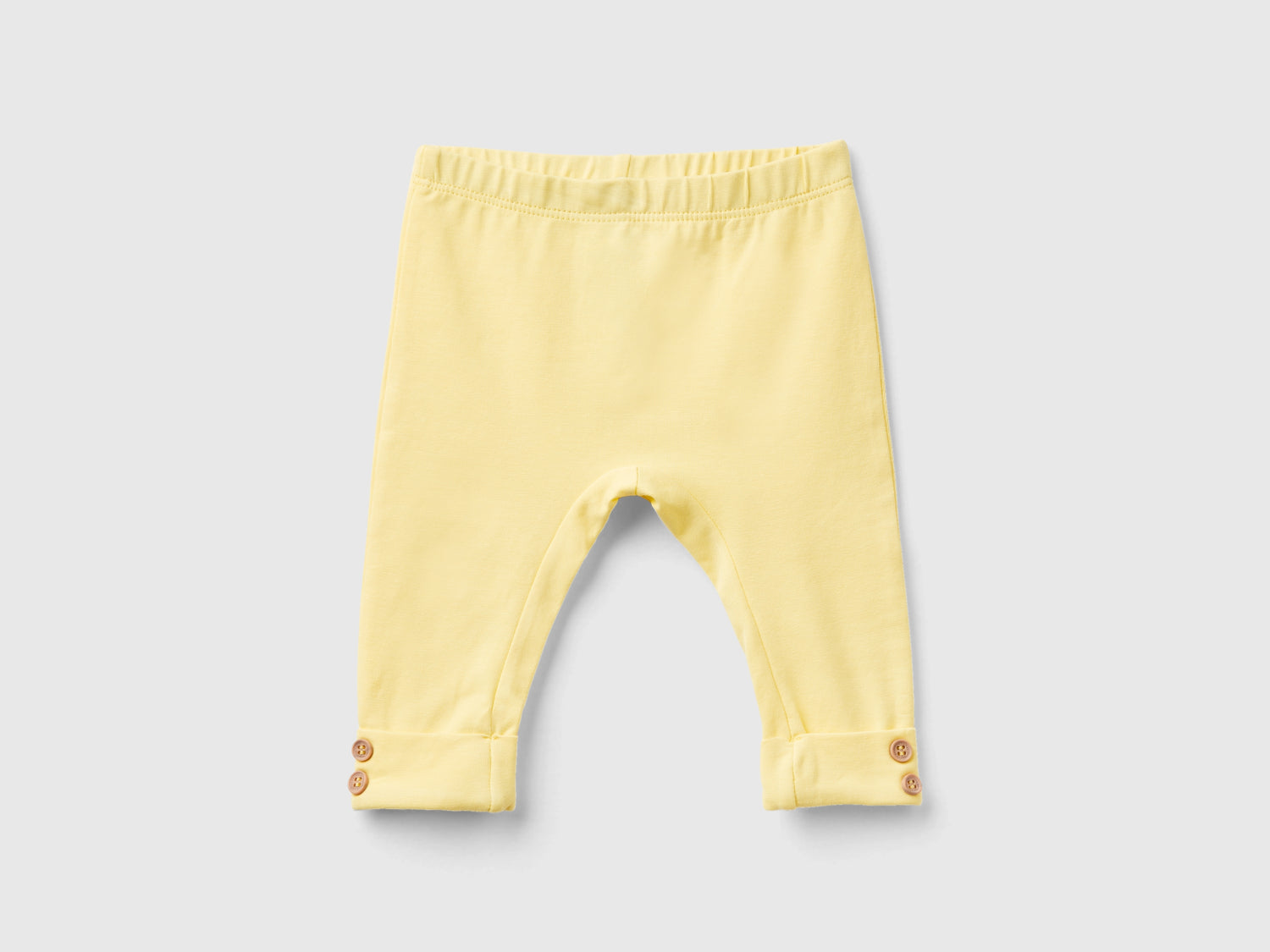 Leggings in cotone stretch da neonato giallo | Benetton Outlet