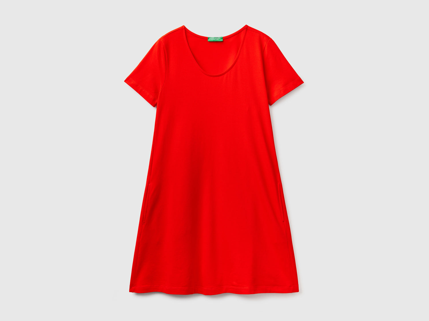 Vestito corto in cotone elasticizzato dal taglio leggermente svasato da donna arancione | Benetton Outlet