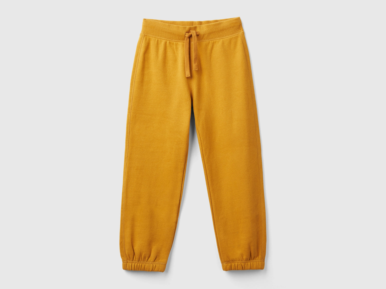 Joggers in calda felpa da bambino senape | Benetton Outlet