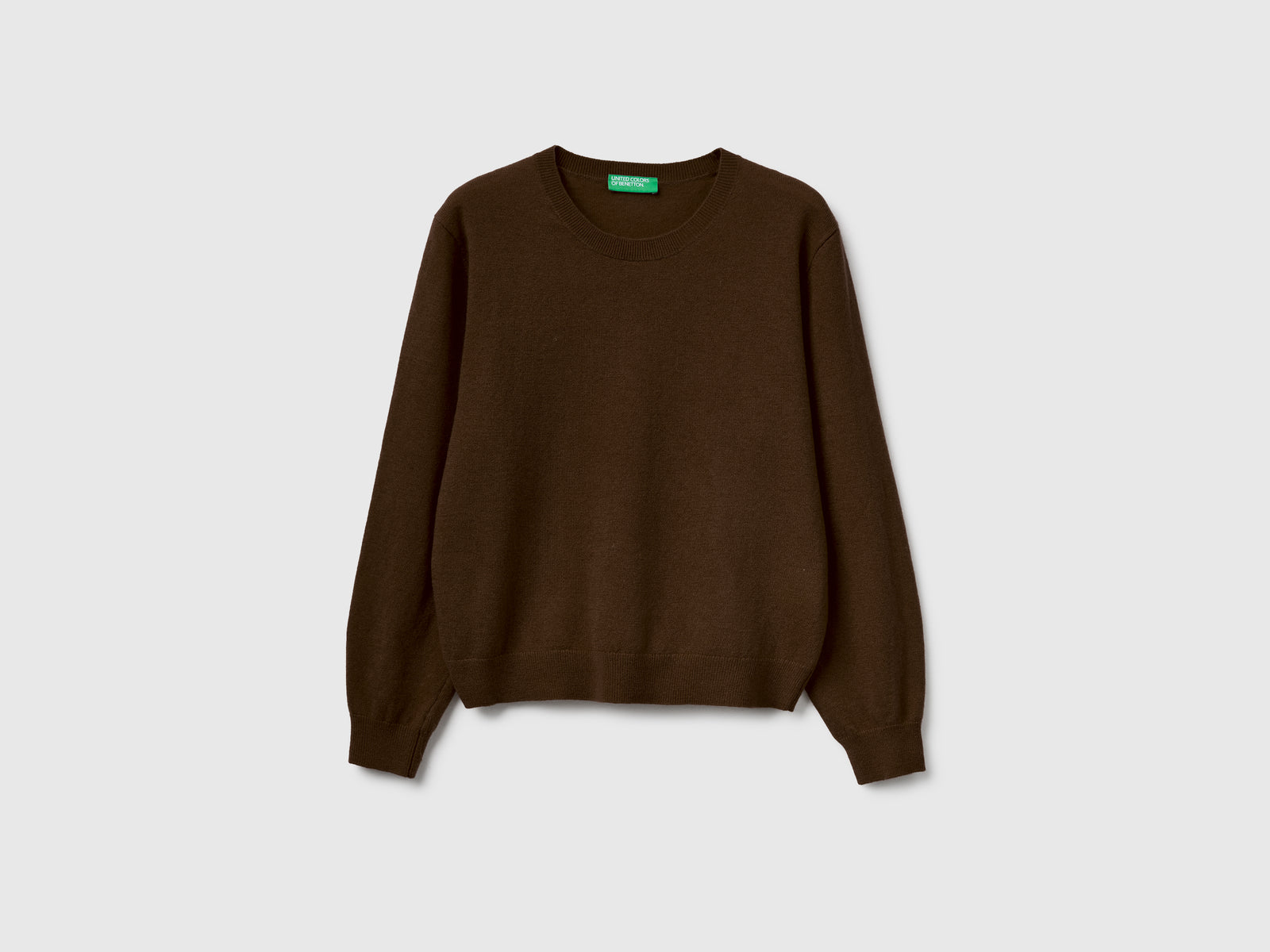 Maglia relaxed fit in pura lana Merino da donna marrone | Benetton Outlet