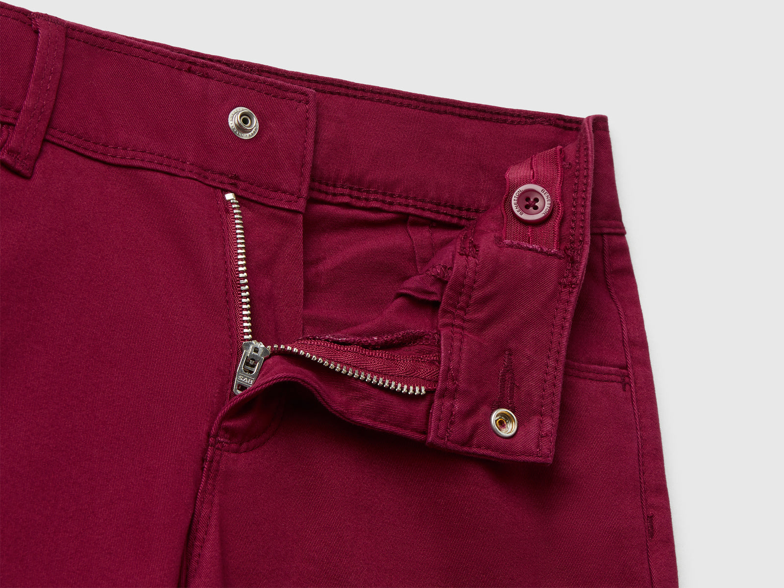Pantaloni ampi in cotone stretch da bambina bordeaux 3 | Benetton Outlet