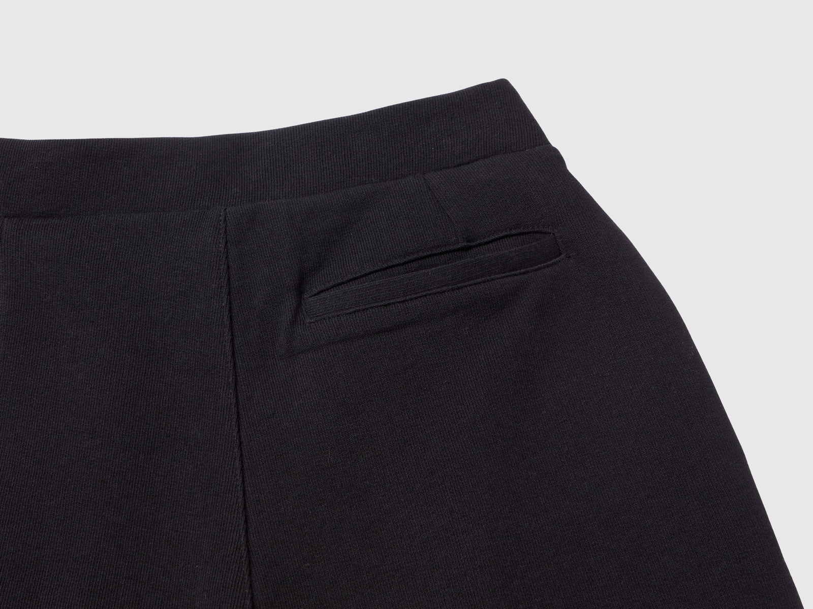 Pantaloni in felpa a vita alta da bambina nero 2 | Benetton Outlet
