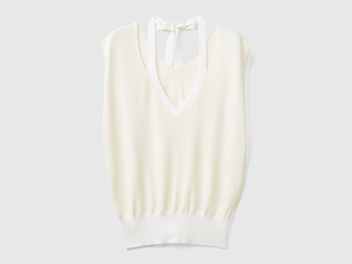 Maglia fluida con scollo a V e lacetti