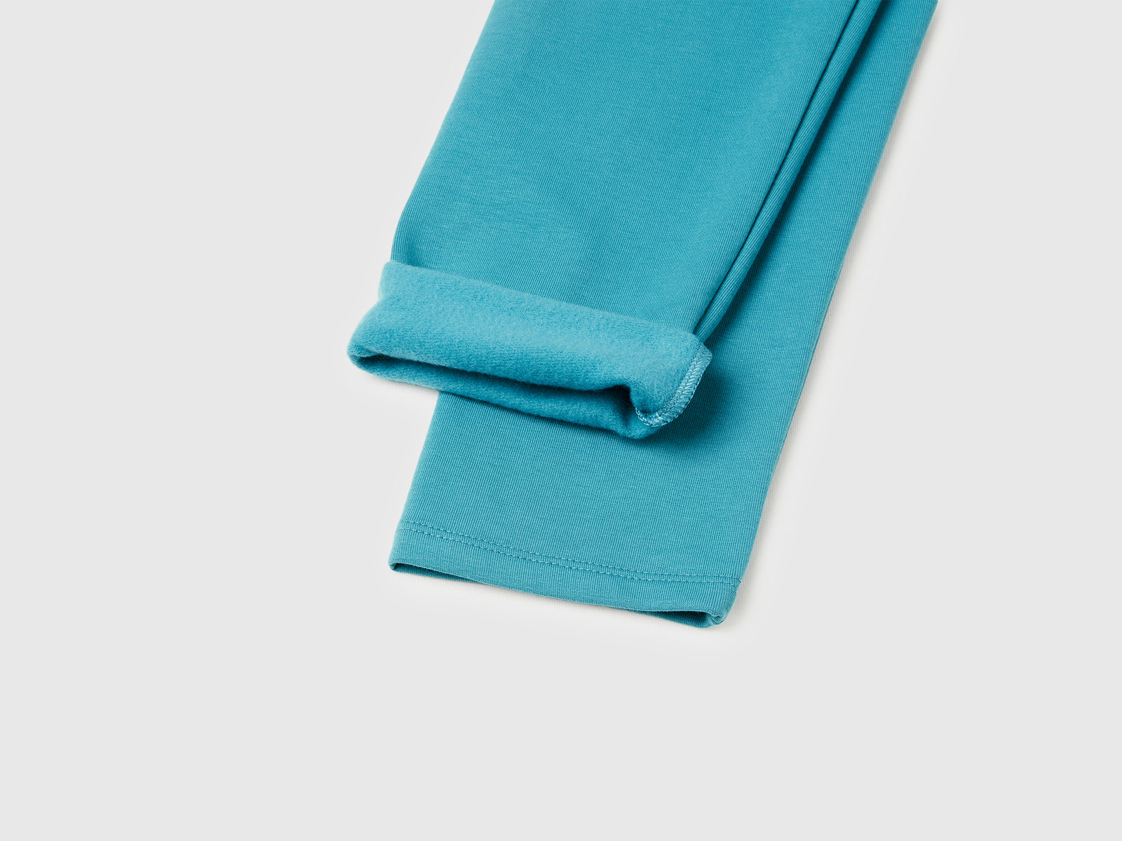 Caldi leggings felpati da bambina turchese 3 | Benetton Outlet