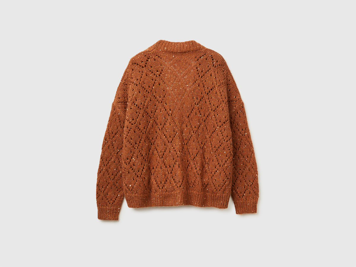 Cardigan traforato con paillettes