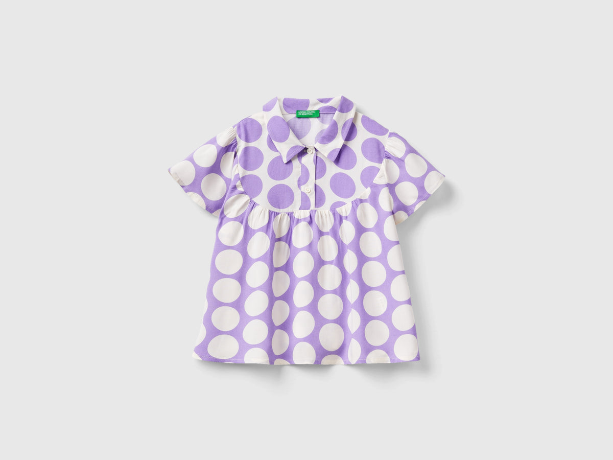 Blusa fluida a pois