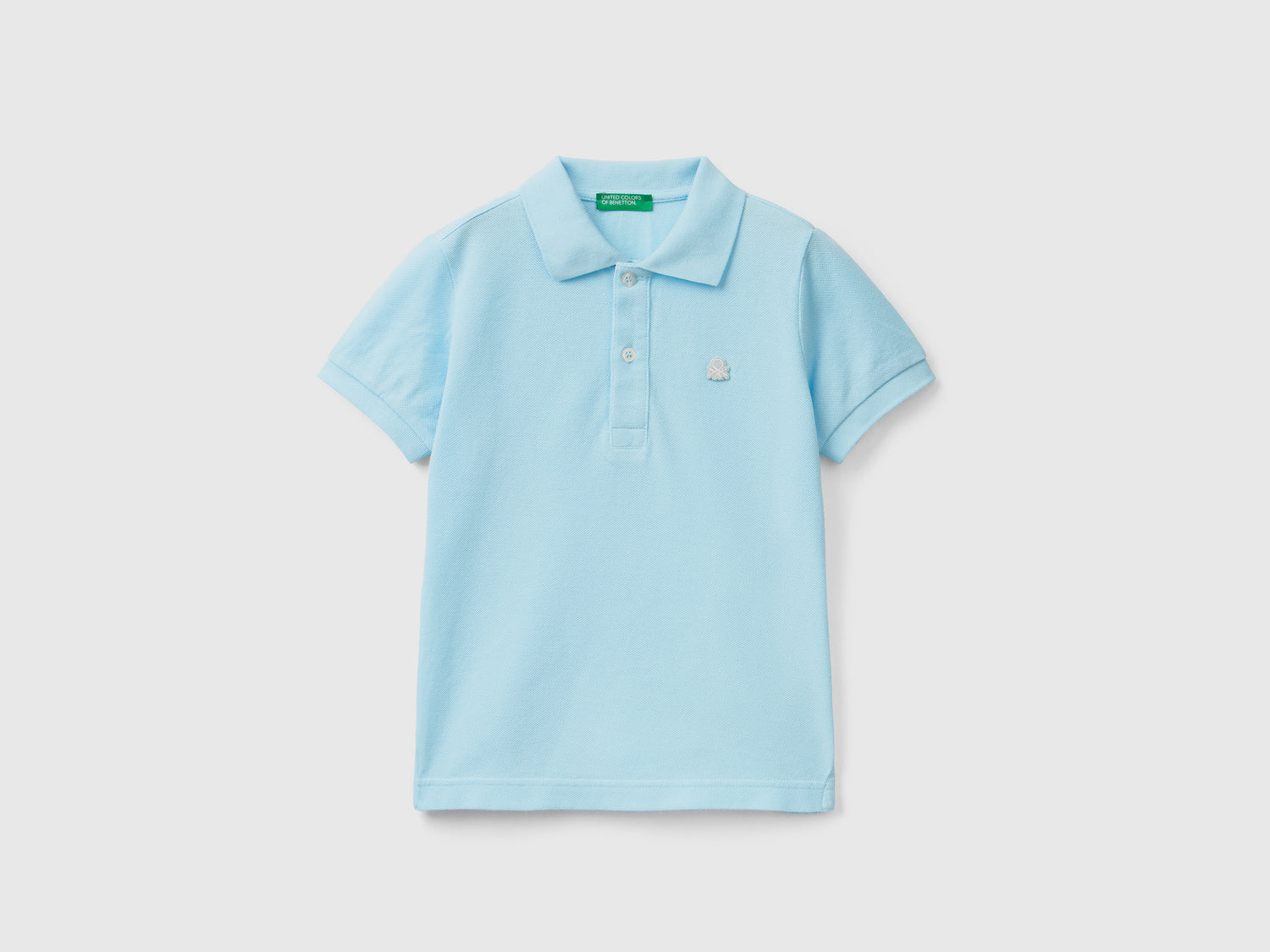 Polo fluo in cotone biologico da bimbo celeste fluo | Benetton Outlet