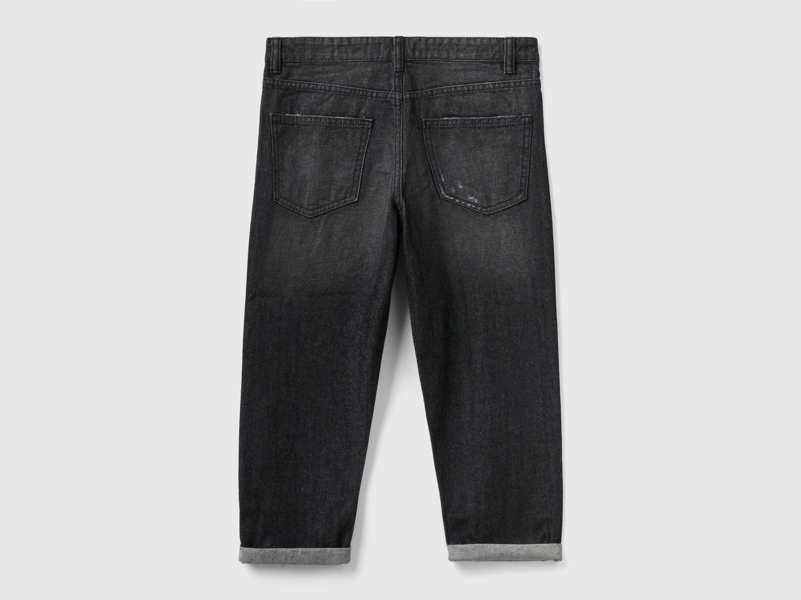 Jeans baloon fit con rotture da bambina nero 2 | Benetton Outlet