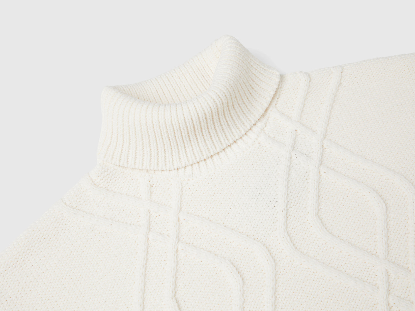 Maglia dolcevita a losanghe da bambina bianco panna 3 | Benetton Outlet