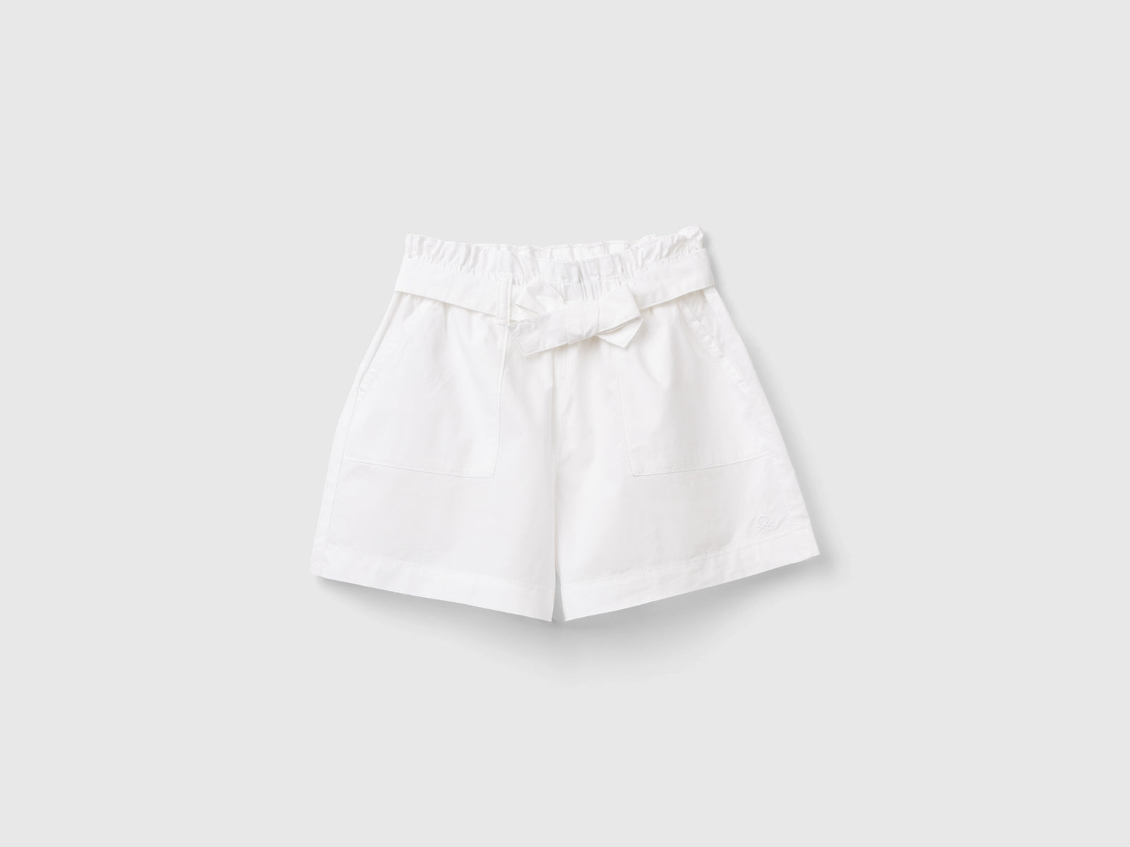 Pantaloni corti paperbag da bambina bianco | Benetton Outlet
