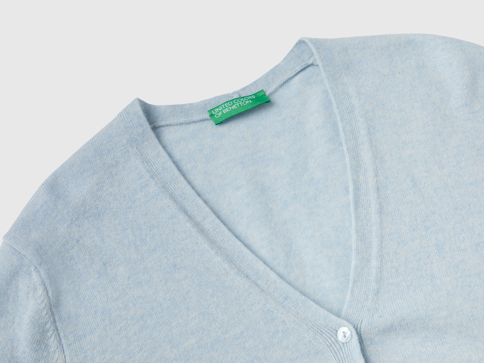 Cardigan scollo a V celeste in pura lana Merino da donna azzurro 3 | Benetton Outlet
