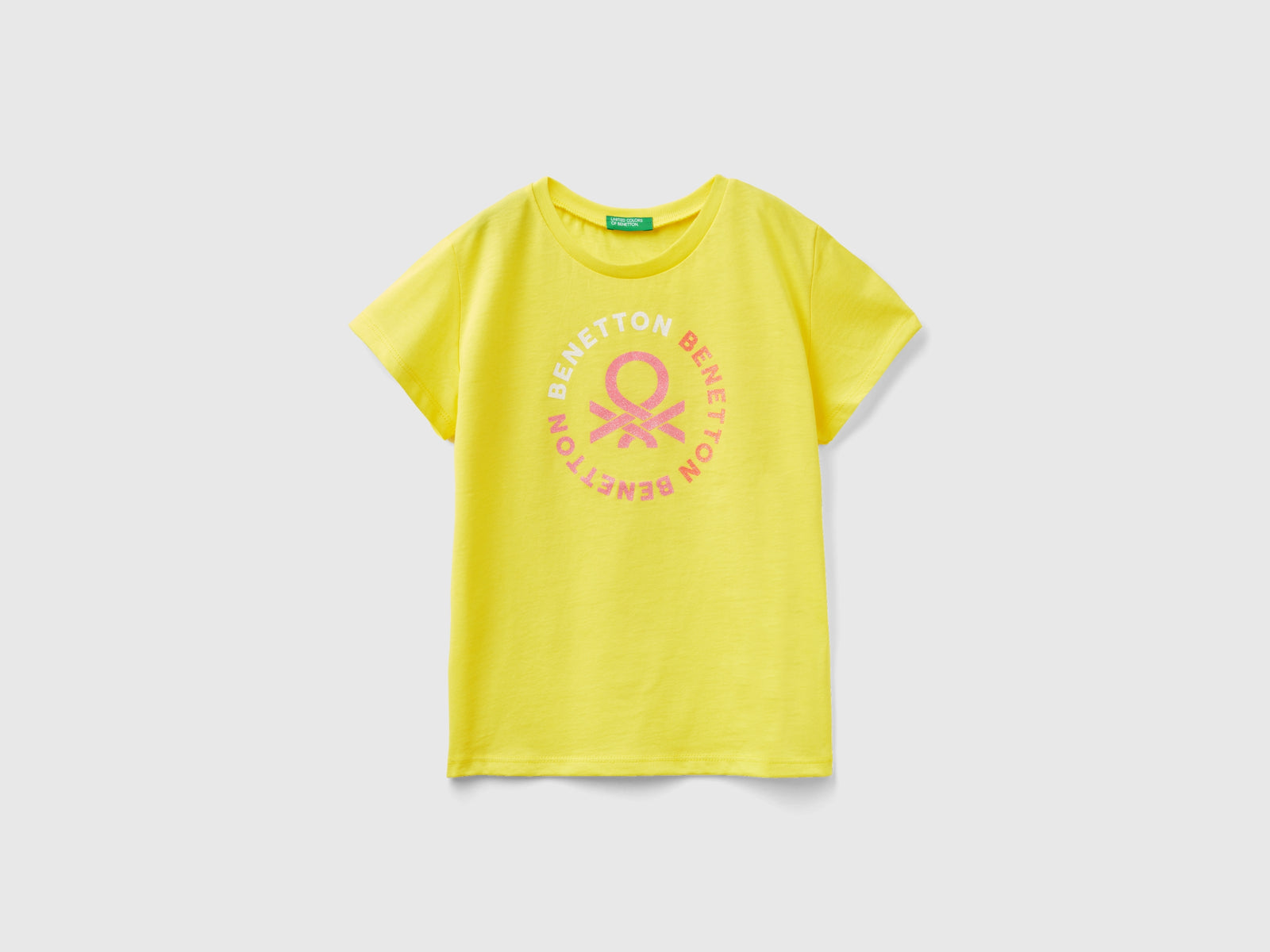 T-shirt con logo glitter in cotone bio da bambina giallo | Benetton Outlet