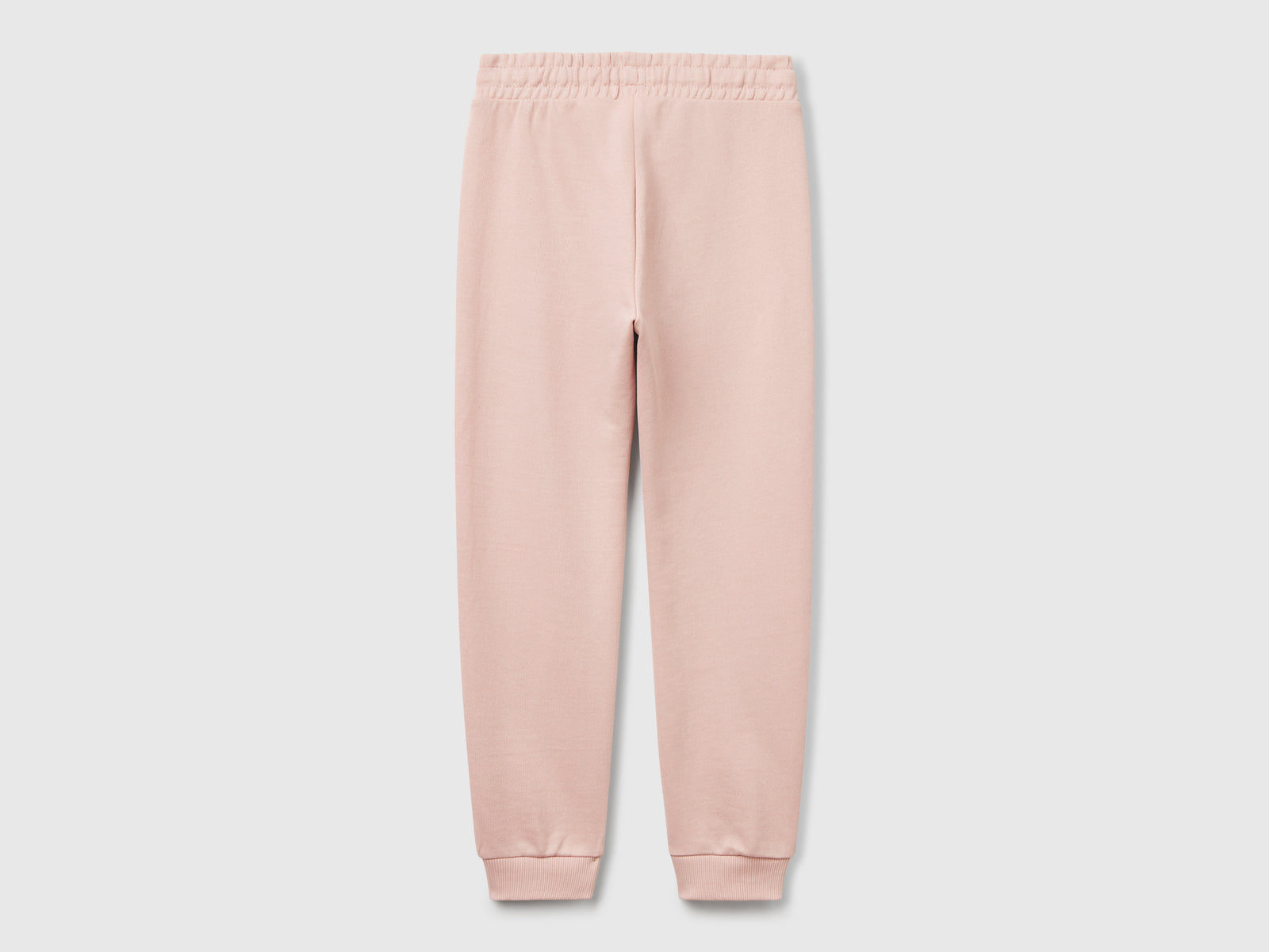 Pantaloni in felpa con logo da bambina rosa carne 2 | Benetton Outlet