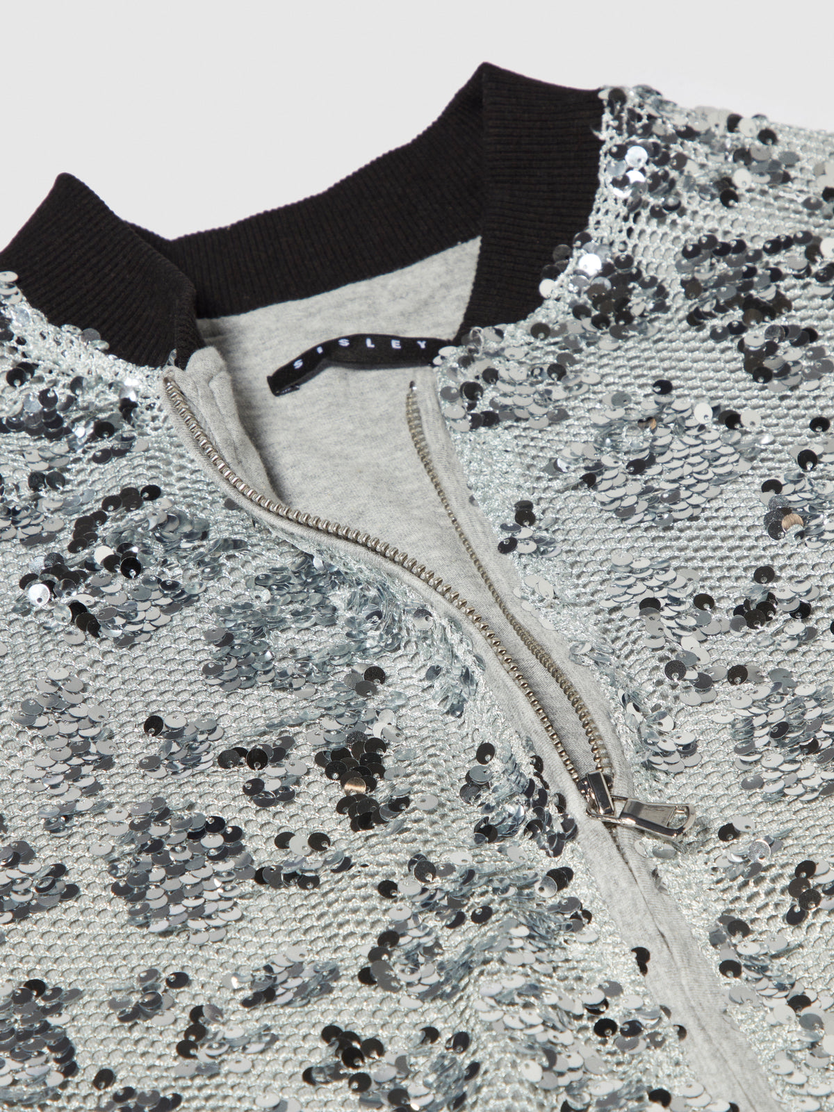 Bomber in rete e paillettes