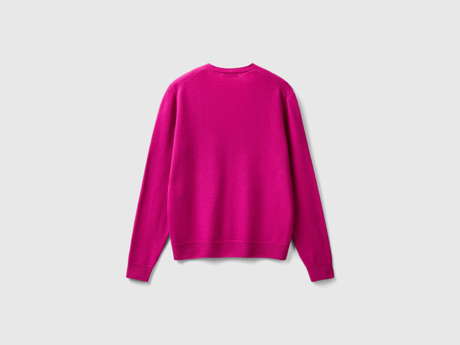 Cardigan scollo a V fucsia in pura lana Merino da donna ciclamino 2 | Benetton Outlet
