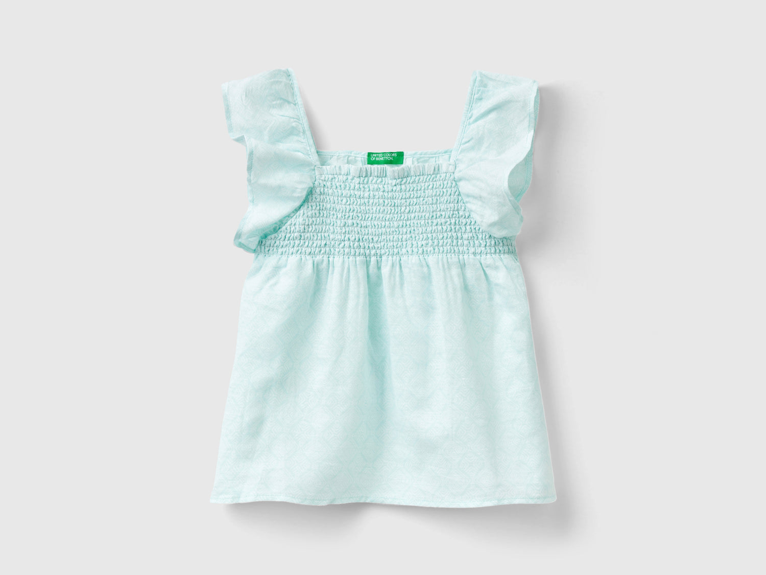 Blusa fantasia in misto lino da bambina rosa pastello | Benetton Outlet