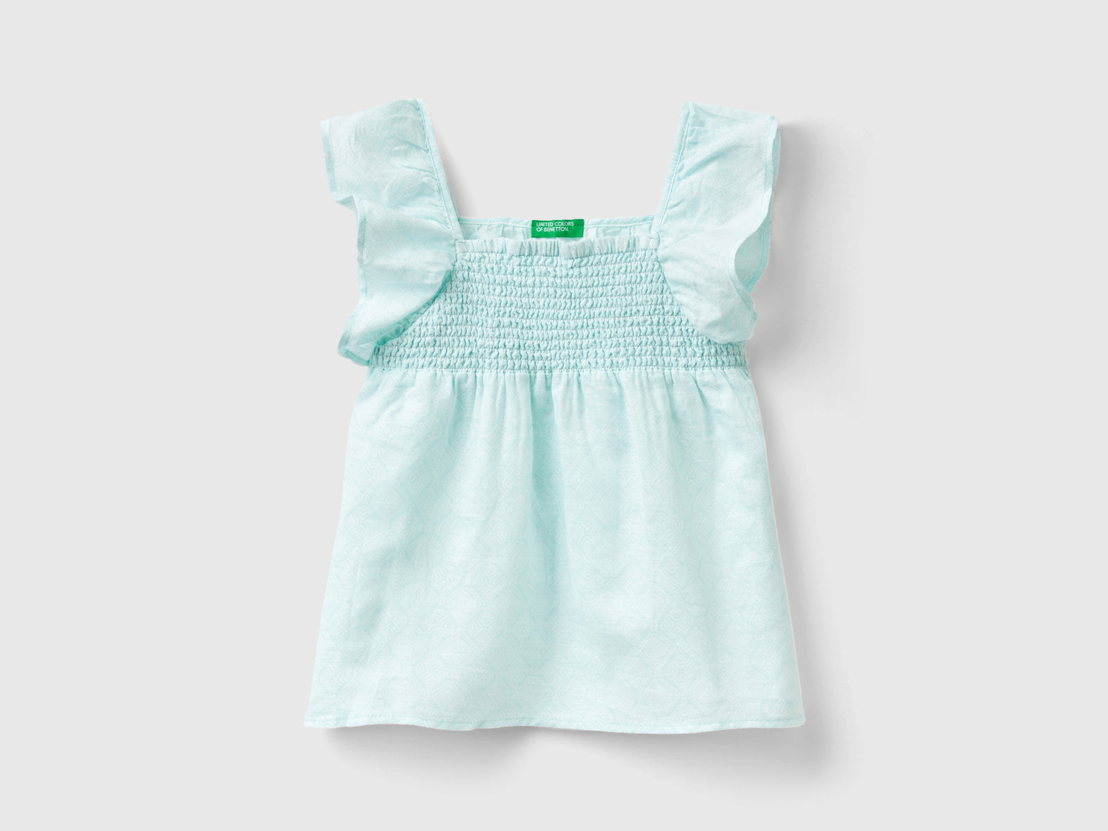 Blusa fantasia in misto lino da bambina rosa pastello | Benetton Outlet