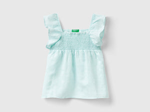 Blusa fantasia in misto lino