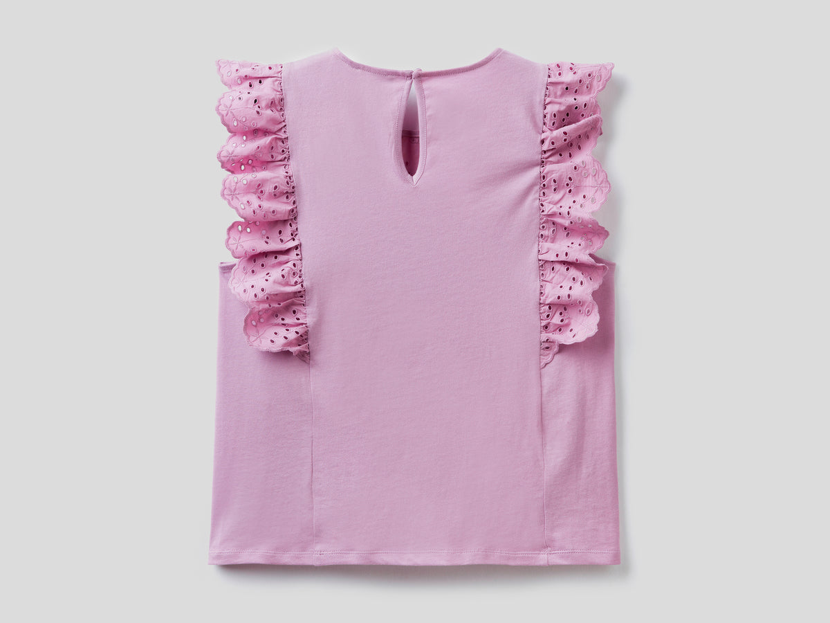 Blusa in sangallo con volant