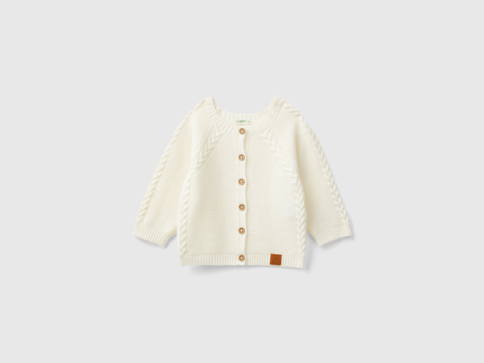 Cardigan con trecce in misto lana riciclata da neonato bianco panna | Benetton Outlet