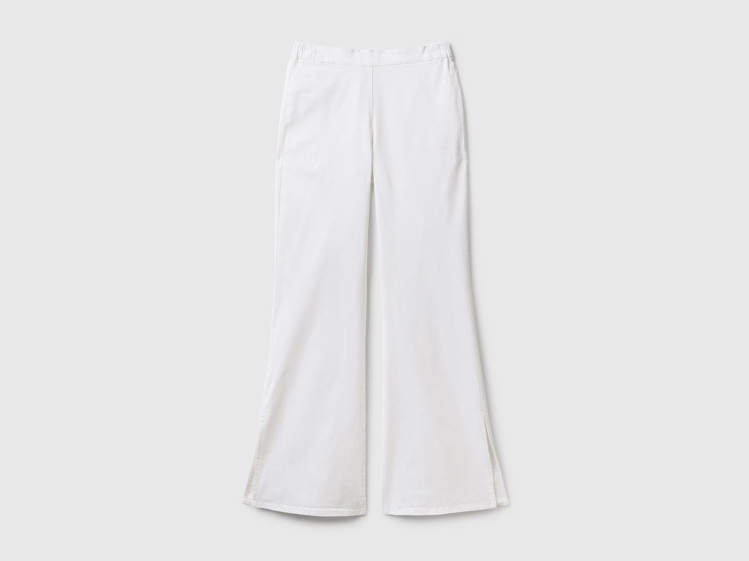 Pantaloni a zampa con spacchi da donna bianco | Benetton Outlet