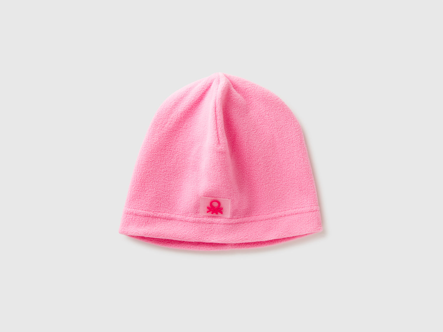 Berretto con logo in pile da bimbo rosa | Benetton Outlet