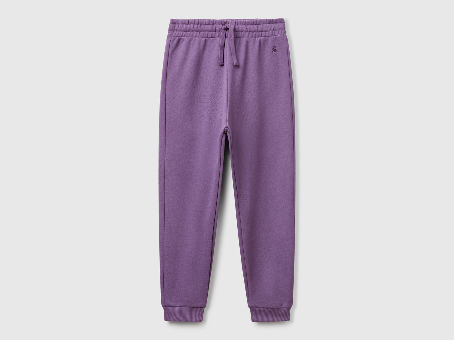 Pantaloni in felpa con logo da bambina viola | Benetton Outlet