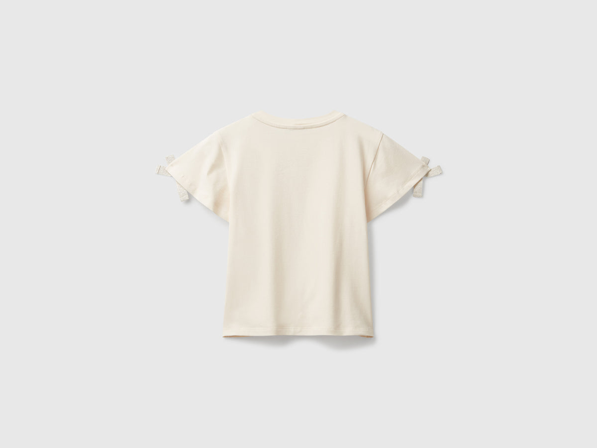 T-shirt con fiocchetti