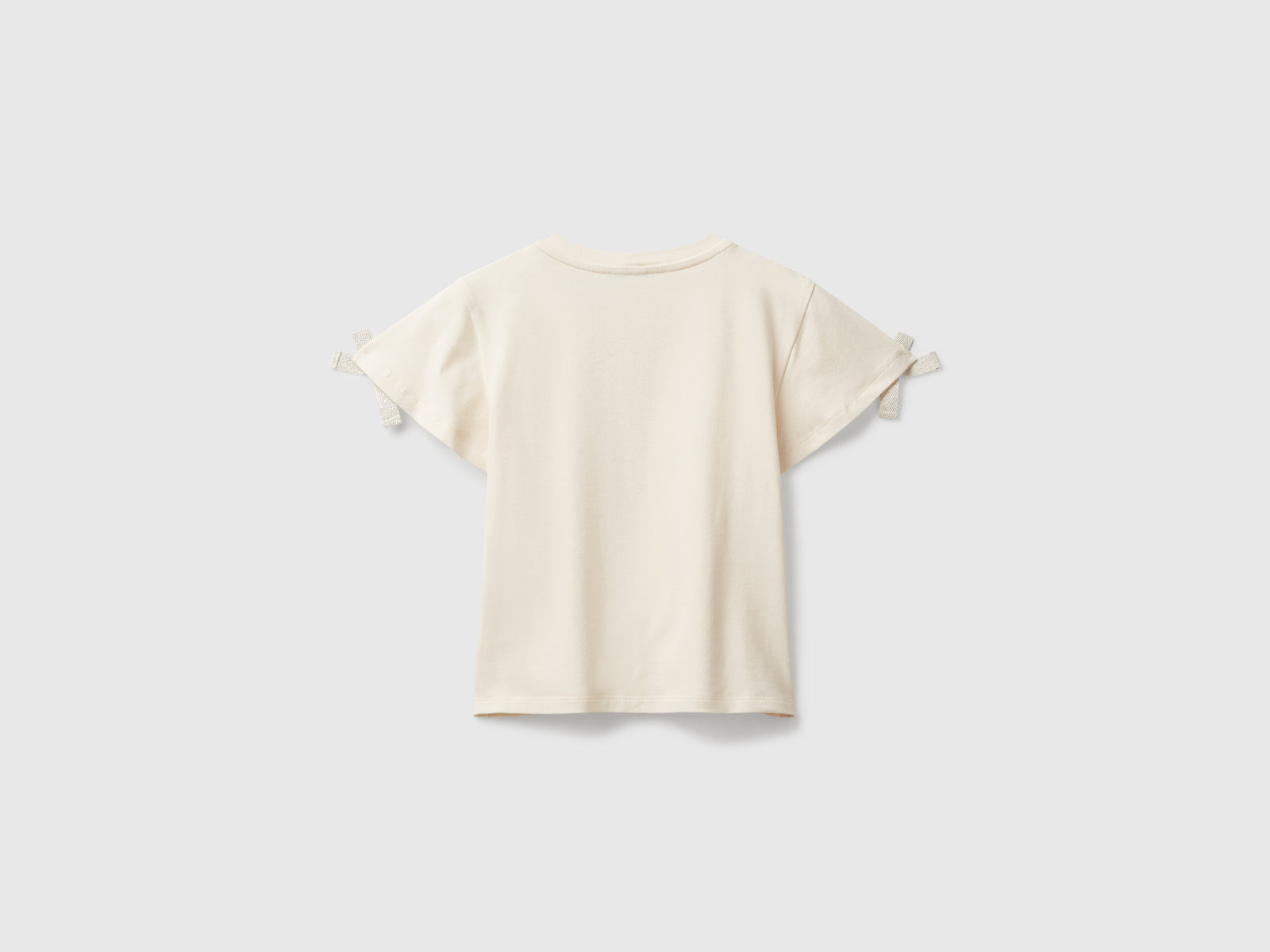 T-shirt con fiocchetti da bambina bianco panna 2 | Benetton Outlet