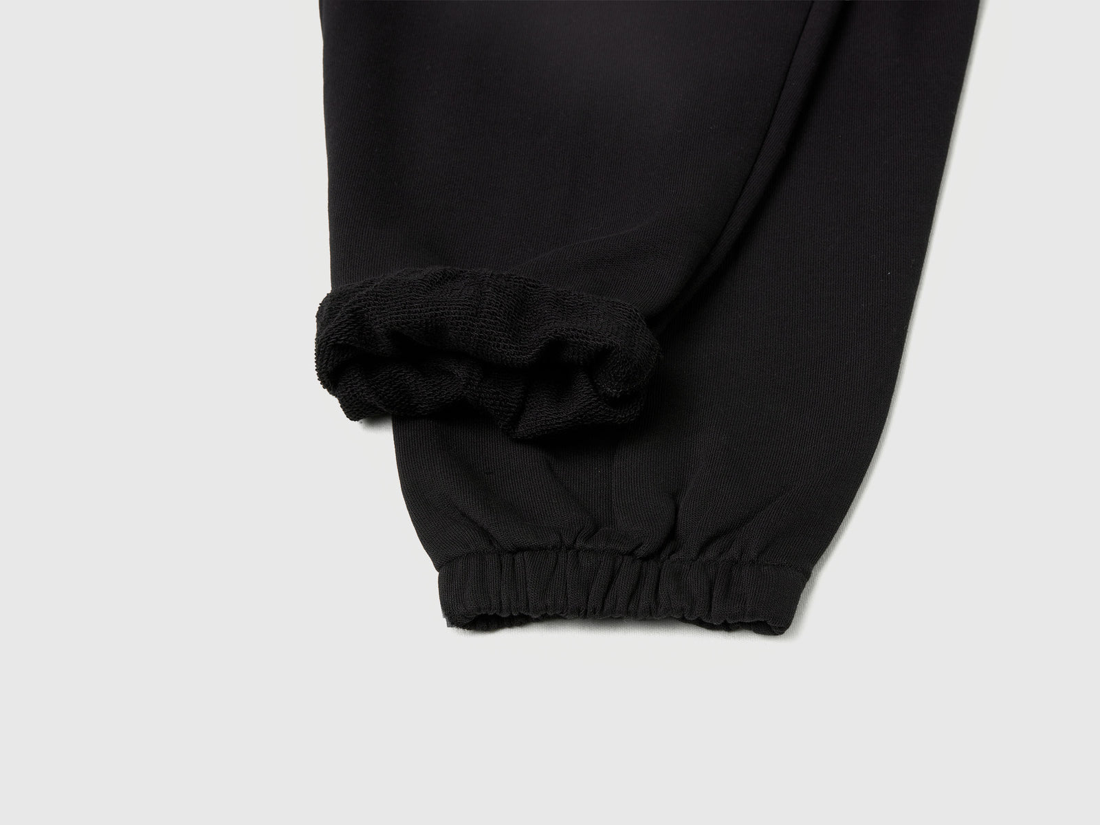 Joggers ampi con tasche da bambino nero 3 | Benetton Outlet