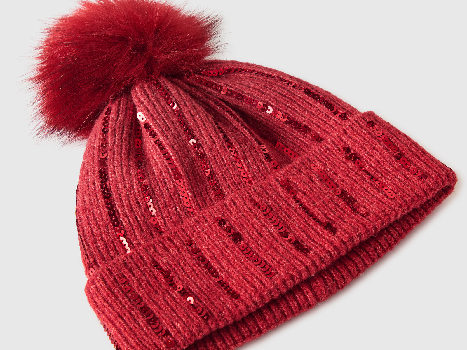 Cappello con pom pom e paillettes da bambina rosso 3 | Benetton Outlet