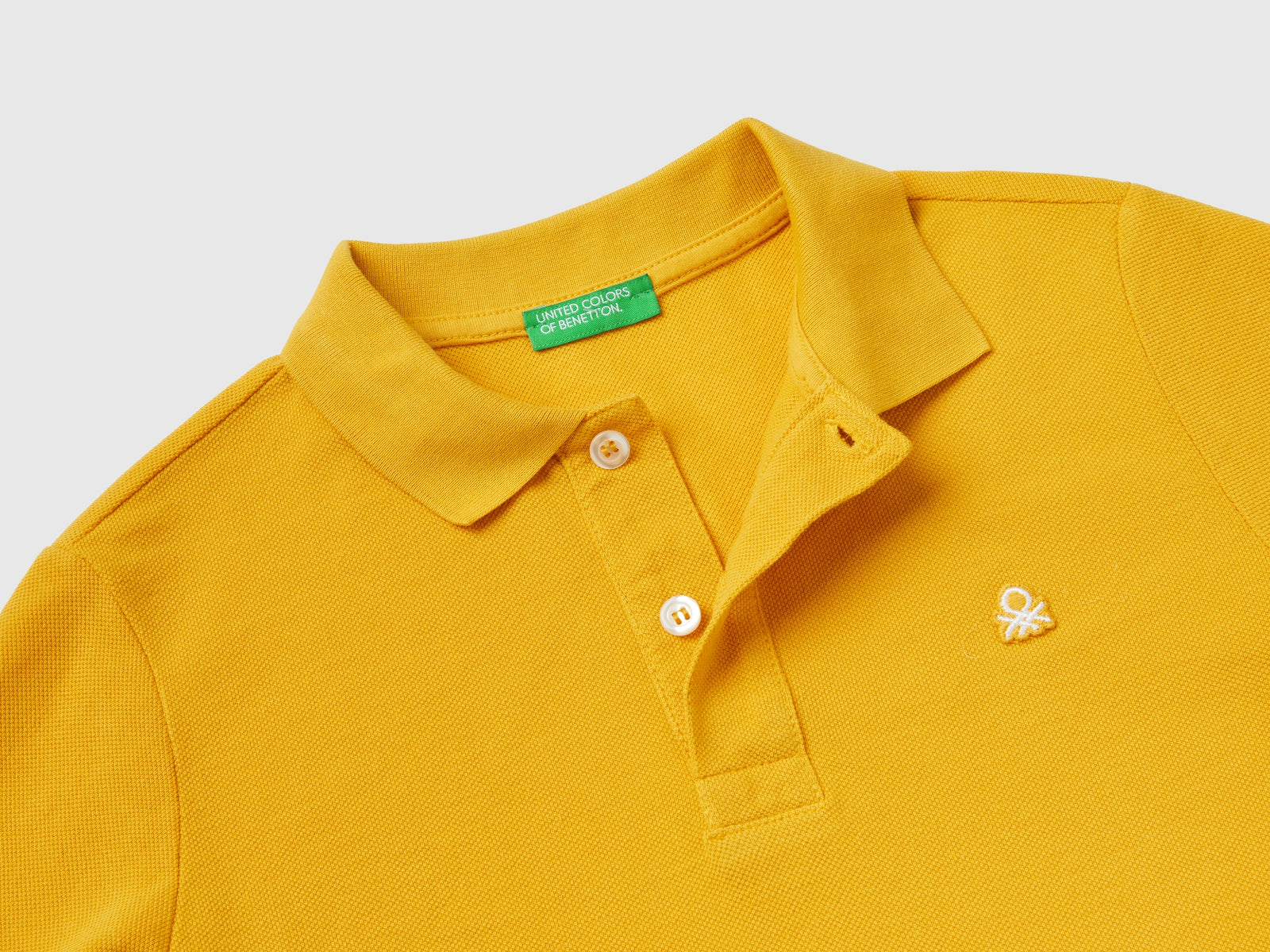 Polo manica lunga 100% cotone bio da bambino giallo 2 | Benetton Outlet