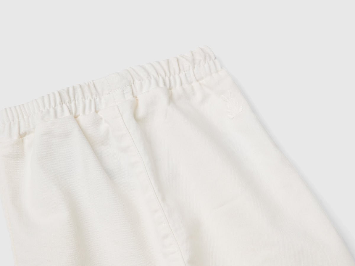 Pantaloni stretch con coulisse