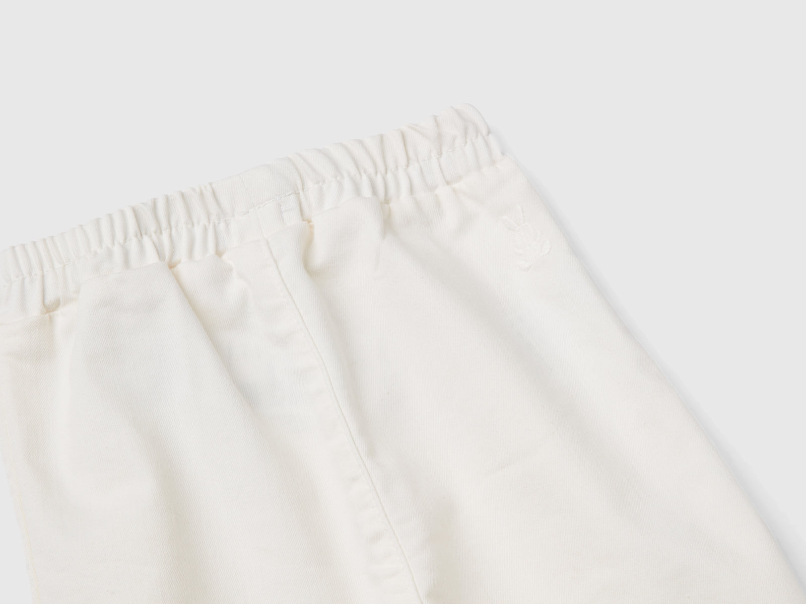 Pantaloni stretch con coulisse da neonato bianco panna 2 | Benetton Outlet