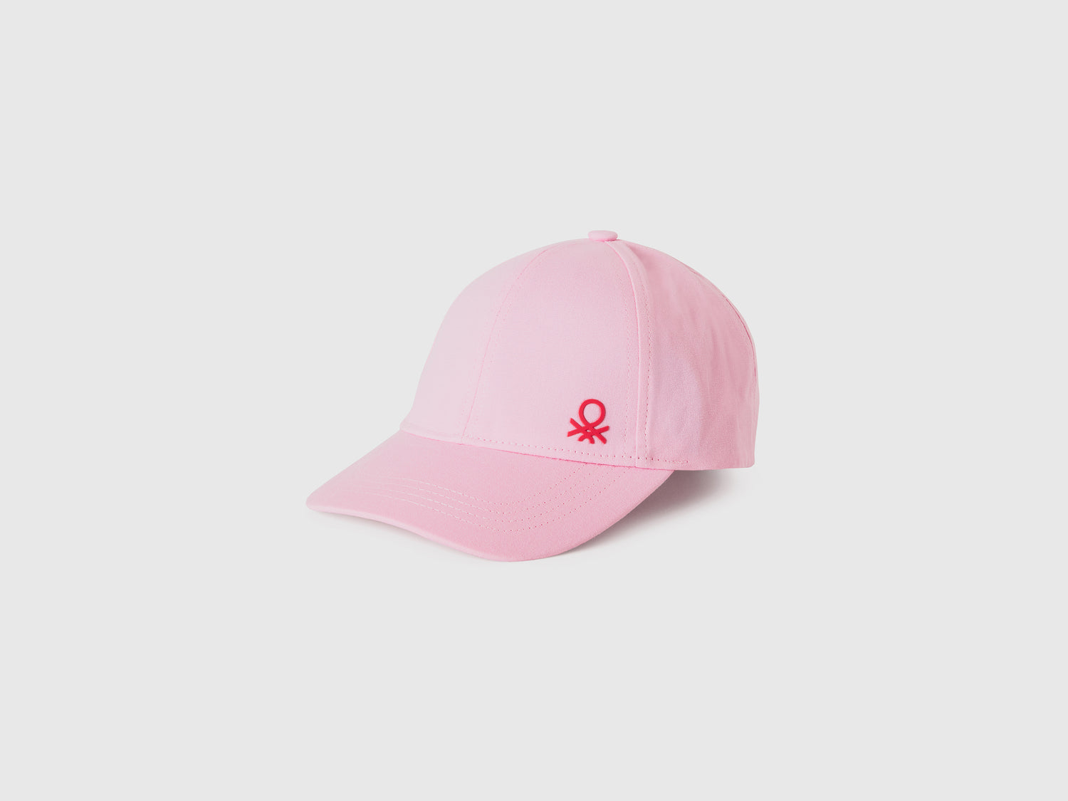 Cappellino con visiera da bimbo rosa | Benetton Outlet