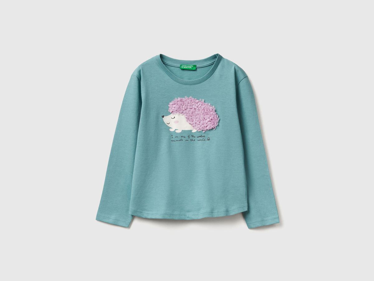 T-shirt con applicazione effetto petali