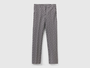 Pantaloni con stampa fiori