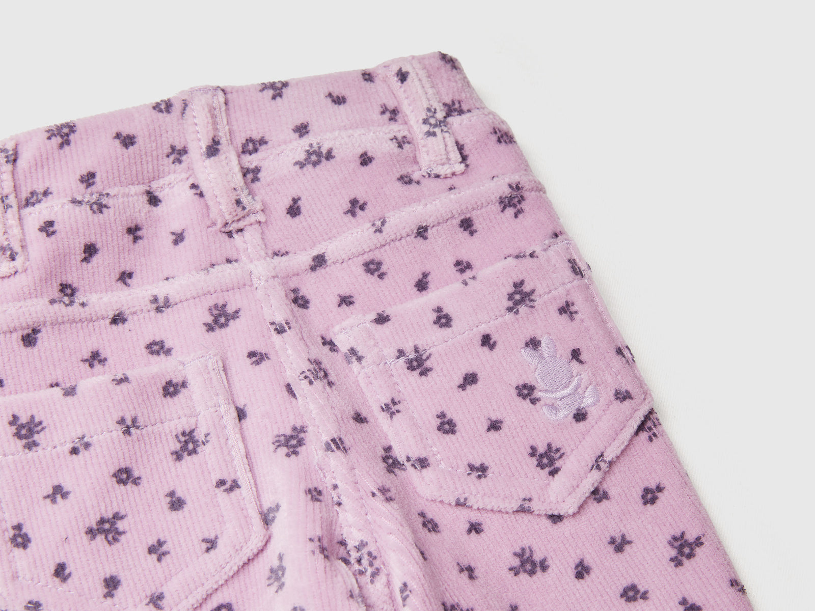 Pantaloni con stampa fantasia in ciniglia da neonato rosa 3 | Benetton Outlet