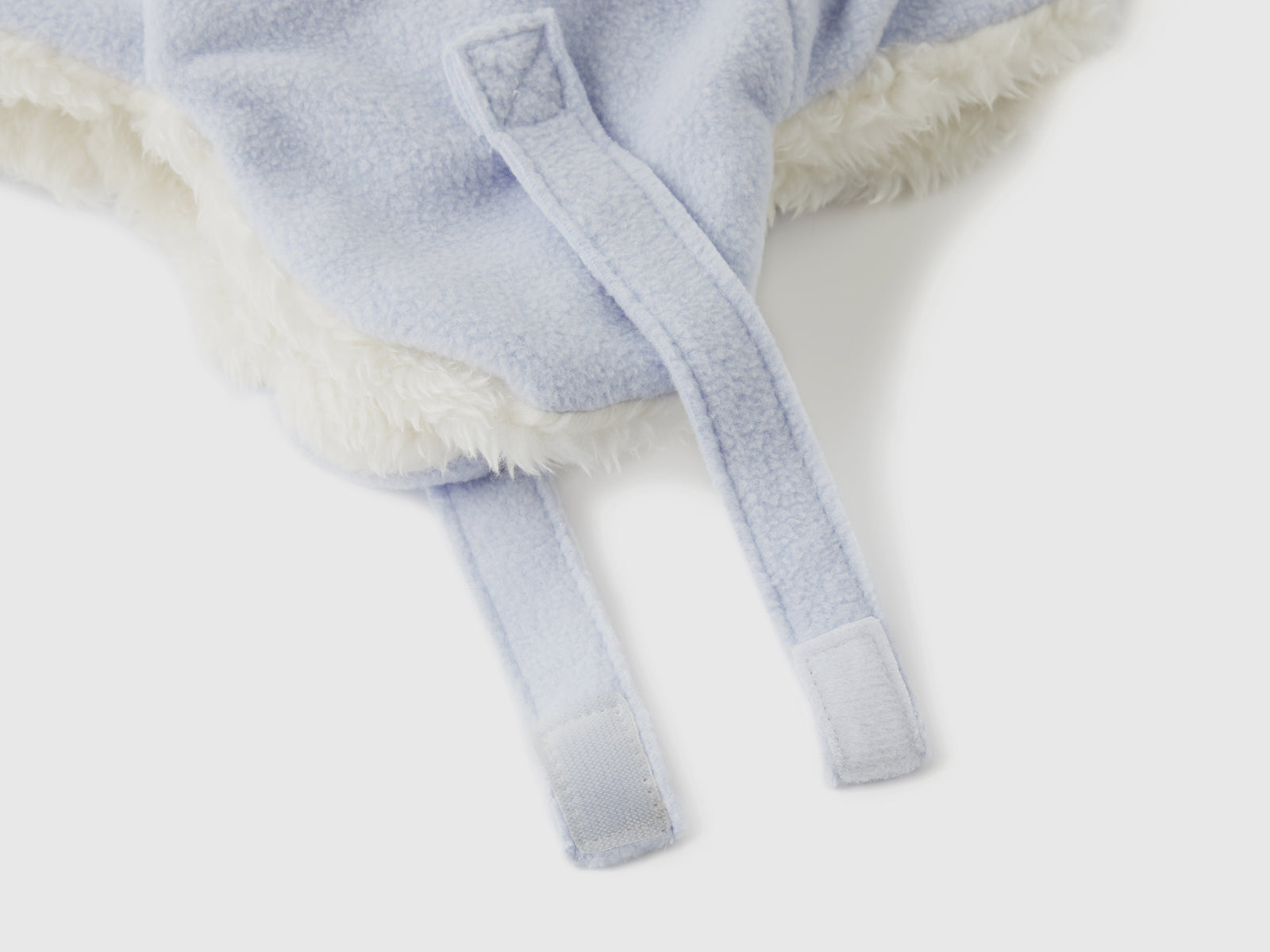 Cappello con paraorecchie in pile da neonato celeste 3 | Benetton Outlet