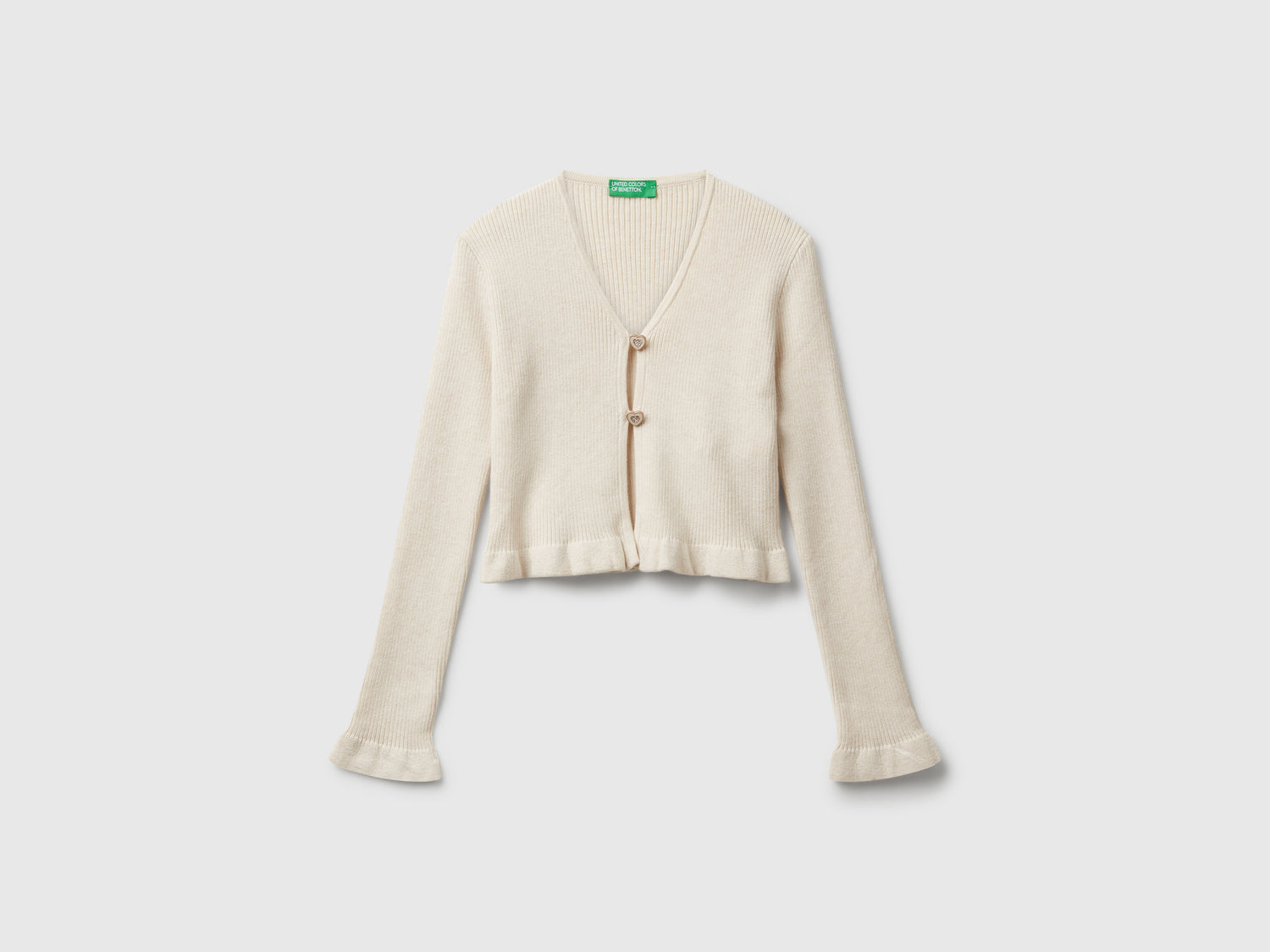 Cardigan con bottoni cuoricino da bambina bianco panna | Benetton Outlet