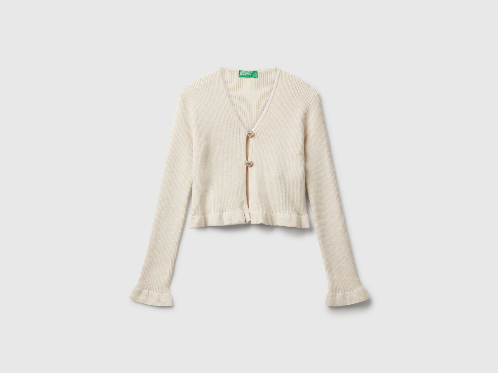 Cardigan con bottoni cuoricino da bambina bianco panna | Benetton Outlet