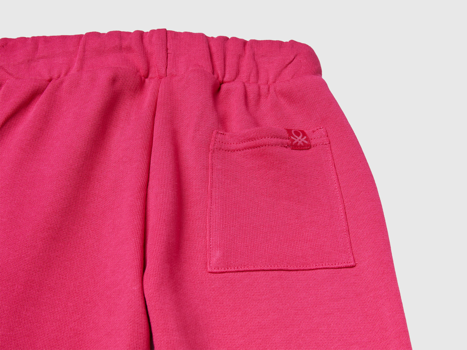 Tuta in felpa con logo da bimbo ciclamino 3 | Benetton Outlet