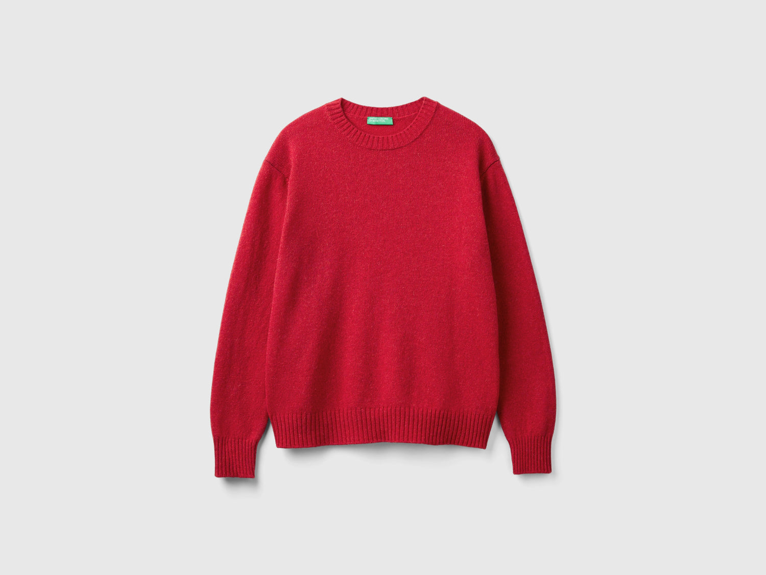 Maglia relaxed fit in pura lana Shetland da uomo corallo | Benetton Outlet