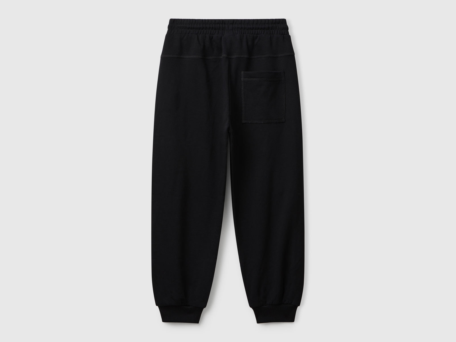 Pantaloni in felpa con stampa graffiti da bambino nero 2 | Benetton Outlet