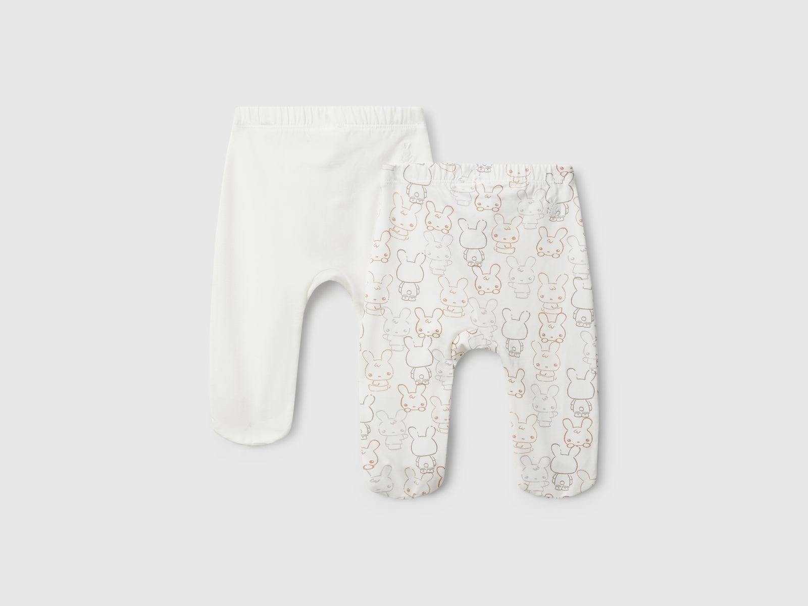 Due pantaloni in cotone da neonato bianco panna 2 | Benetton Outlet