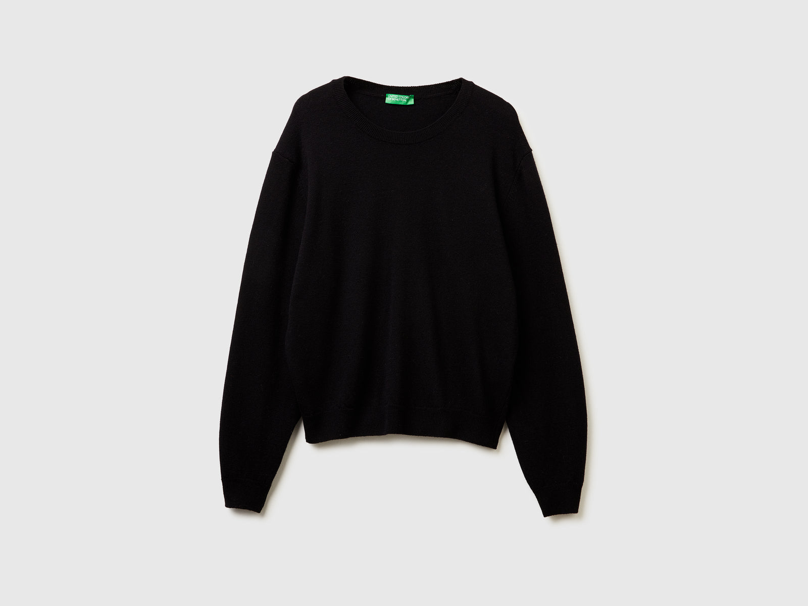 Maglia relaxed fit in pura lana Merino da donna nero | Benetton Outlet