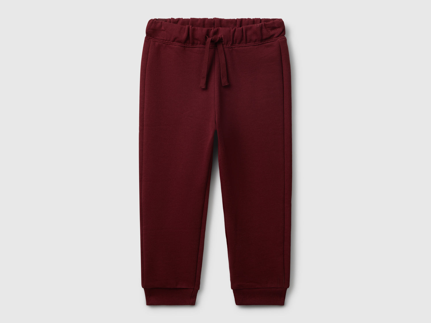 Joggers in felpa regular fit da bimbo bordeaux | Benetton Outlet