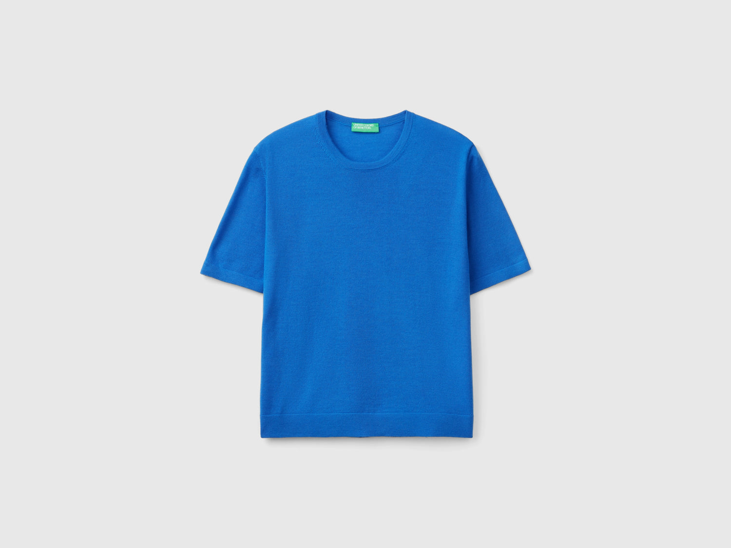 Maglia manica corta in pura lana Merino da donna azzurro | Benetton Outlet