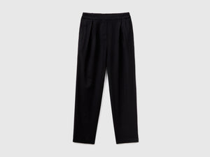 Pantaloni lunghi carrot fit in lino misto viscosa
