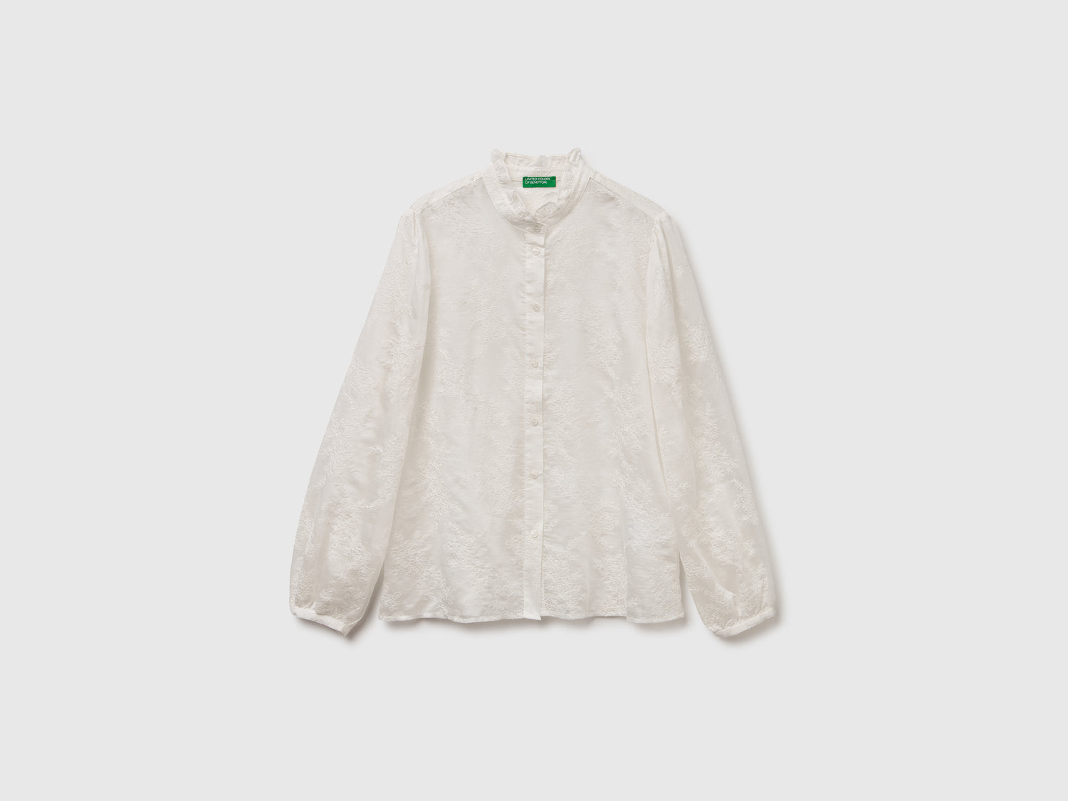 Blusa ricamata con collo rouches da donna bianco panna | Benetton Outlet